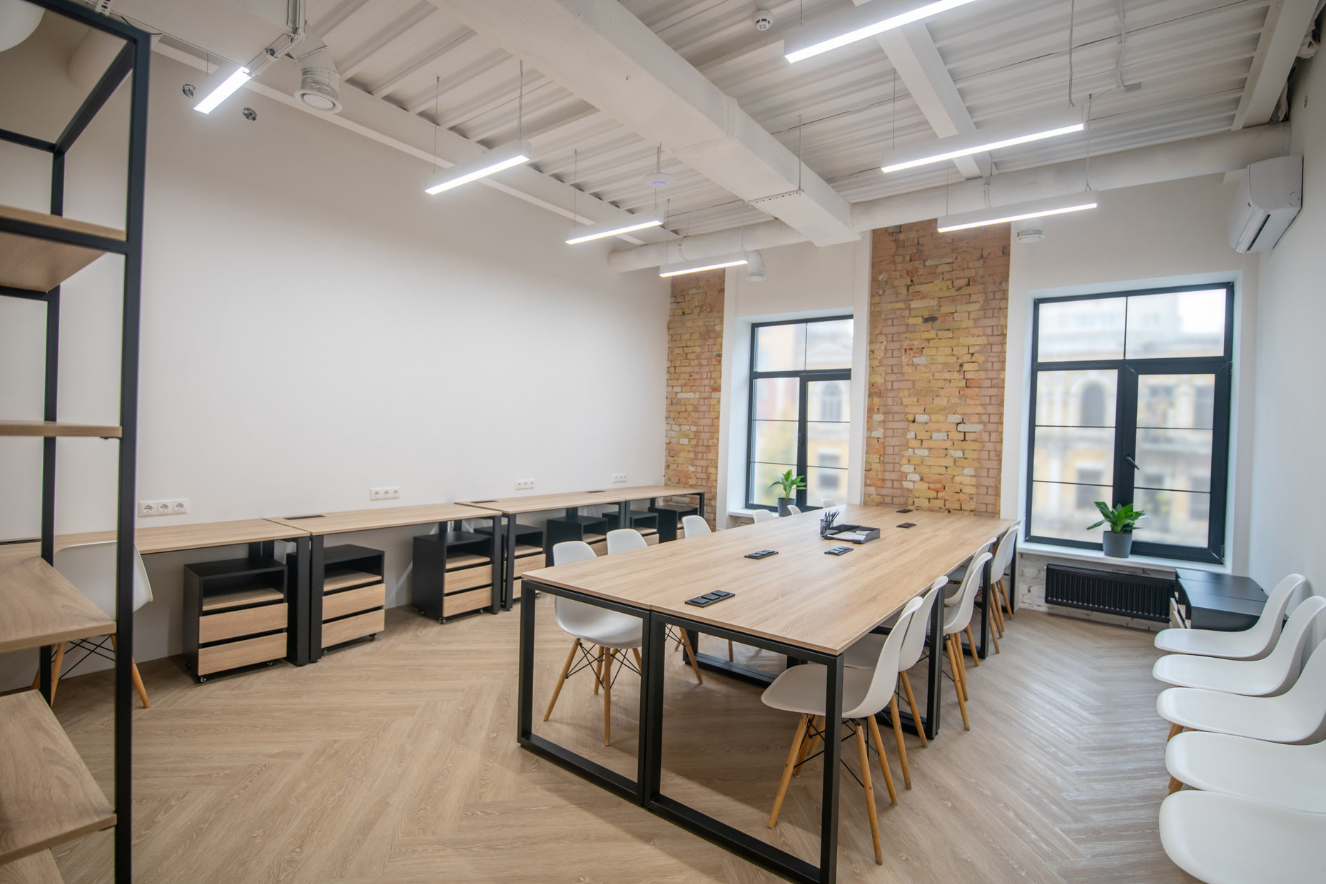 Light office with new furniture and striplights